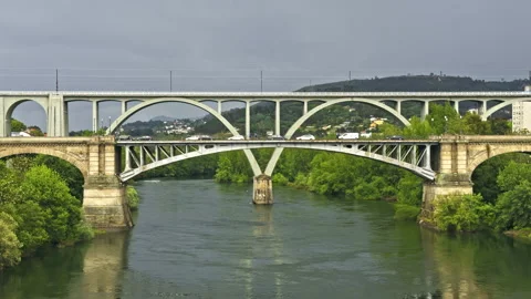 Double Arched Bridges Over River with Traffic Video stock 277746452