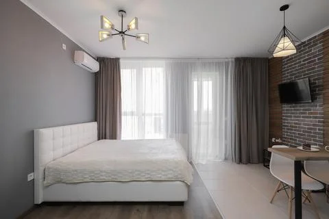 Double bed in the apartment interior 写真素材