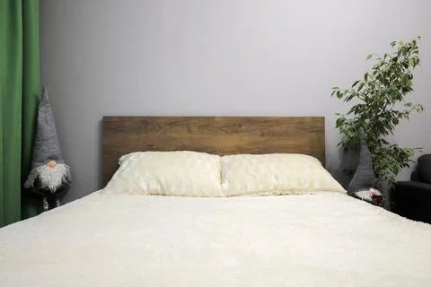Double bed in the bedroom interior Stock-Fotos