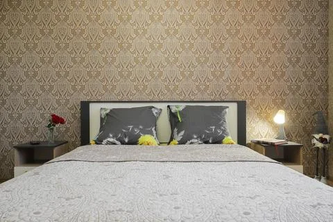 Double bed in the bedroom interior Stock Photos