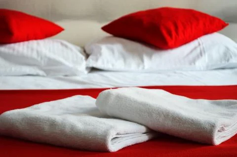 Double bed in hotel room. accommodation Stock Photos