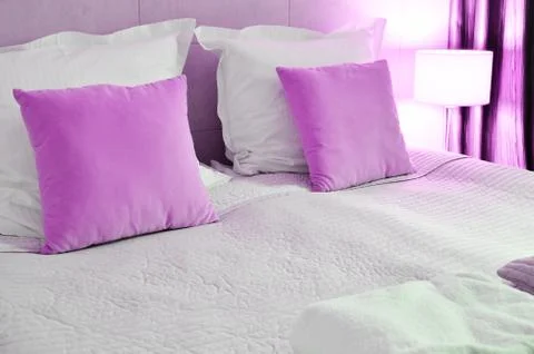 Double bed in hotel room. Accommodation Stock Photos