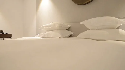Double bed in a hotel room Stock Footage 105222940