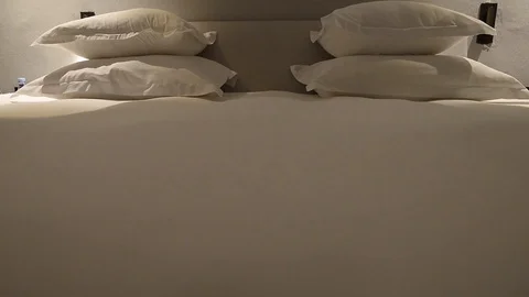 Double bed in a hotel room Stock Footage 105222984