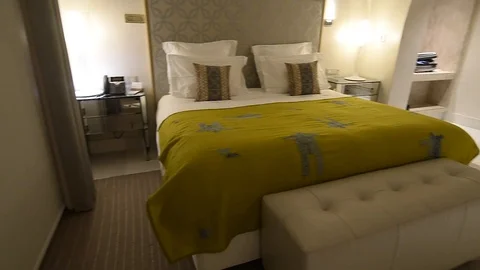Double bed in a hotel room Stock Footage 105226624