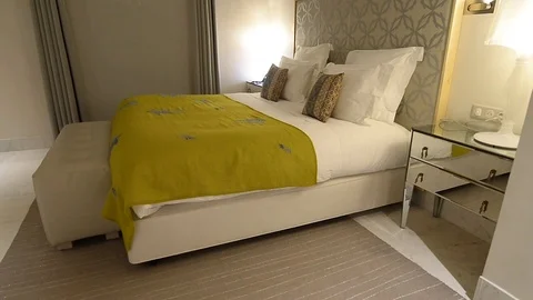 Double bed in a hotel room Stock Footage 105226735