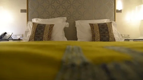 Double bed in a hotel room Stock Footage 105227398