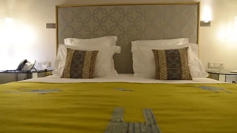 Double bed in a hotel room Stock Footage 105227426