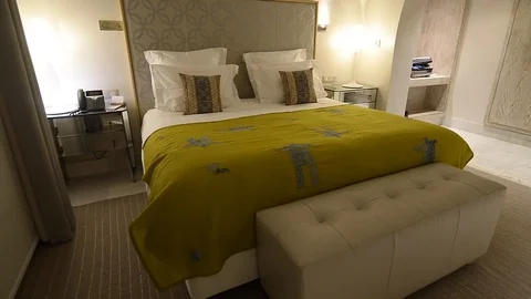 Double bed in a hotel room Stock Footage 105227507