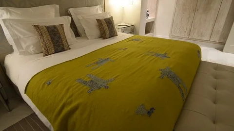 Double bed in a hotel room Stock Footage 105227519