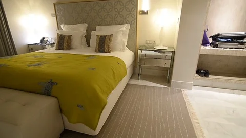 Double bed in a hotel room Stock Footage 105227604
