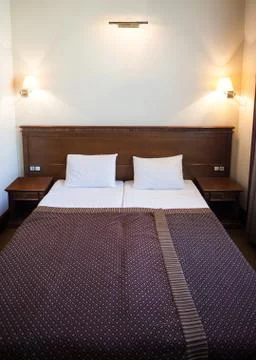 Double bed  with light Stock Photos