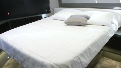 Double bed in master cabin on a yacht  Stock Footage 43322817