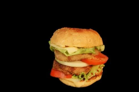 Double cheeseburger, black isolated Stock Photos