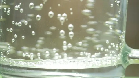 Double cherry in glass of water with bubbles Stock Footage 100145306