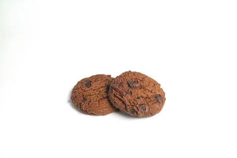 Double choco round cookie biscuit with chocochips. Isolated on white backgr.. 스톡 사진