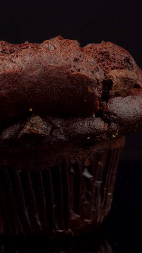 Double Chocolate Muffin Rotating on Dark Background Studio Lighting Stock Footage 330517447