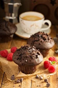 Double chocolate muffins with raspberry Stock Photos
