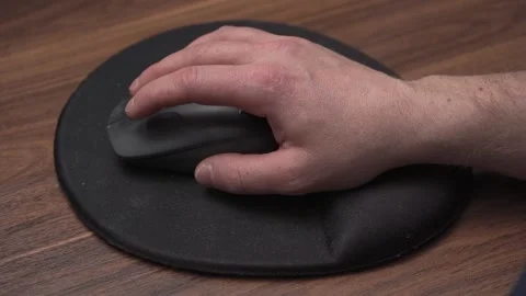 Double clicking mouse on ergonomic mousepad, close up view Stock Footage 335483708