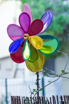 A double colorful wind mill. Stock Photos