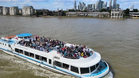 Double deck cruise boat floating on wide river Stock Footage 160237634