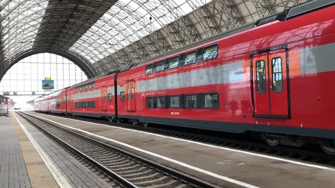 Double deck express train at railway station Stock Footage 110796921
