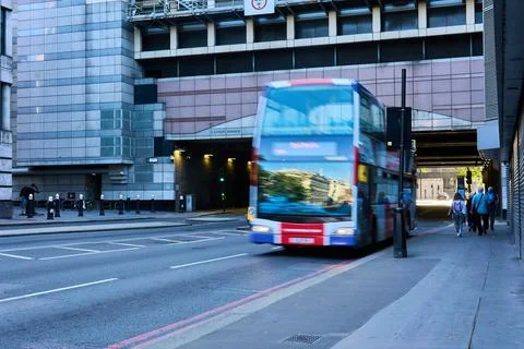 Double Decker Bus Driving High Street 스톡 사진