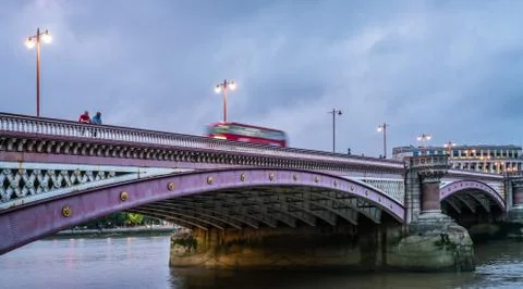 Double decker bus going through the Blackfriars Bridge Stock Photos