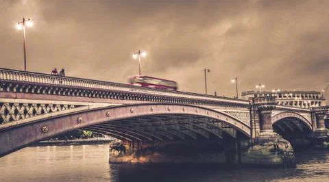 Double decker bus going through the Blackfriars Bridge Stock Photos