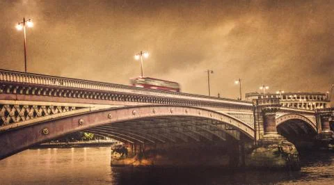 Double decker bus going through the Blackfriars Bridge Foto stock