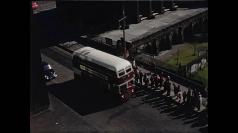 Double Decker Bus Passes By Bus Stop Queue in Edinburgh Stock Footage 48234899