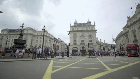Double decker bus passes by Stock Footage 83605644