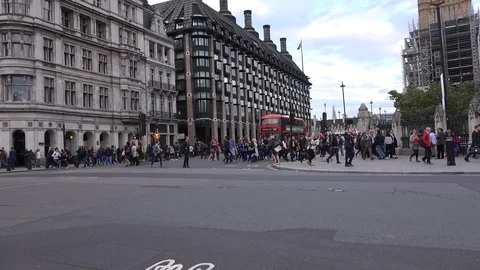 Double decker buses in Parliament Square, London, England, UK stock footage Stock Footage 112976067