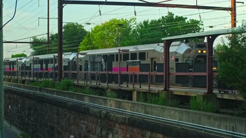 Double decker NJ Transit train arriving at New Brunswick Train station Stock Footage 201156991