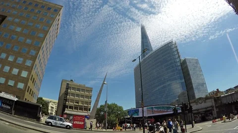 Double-decker passing and The Shard in the ba Stock Footage 78982610