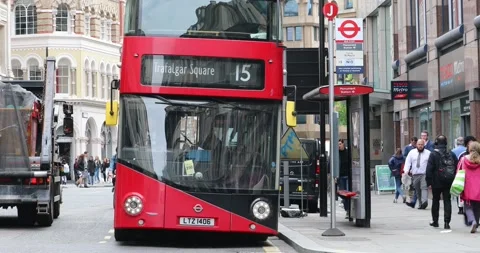 Double-Decker Red Bus Start Driving In London Stock-Footage 133049343