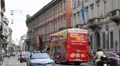 Double Decker Touristic Bus Passing Italian Emergency Police Car Moving Milan HD Footage