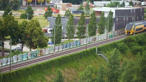Double Decker train passing Stock Footage 111345529