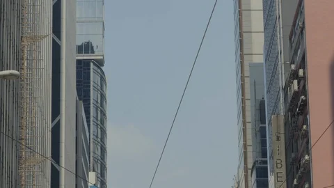 Double decker tram approach the stop in Hong Kong Stock Footage 127505904