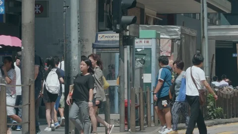 Double decker tram approach the stop in Hong Kong Stock Footage 127506887