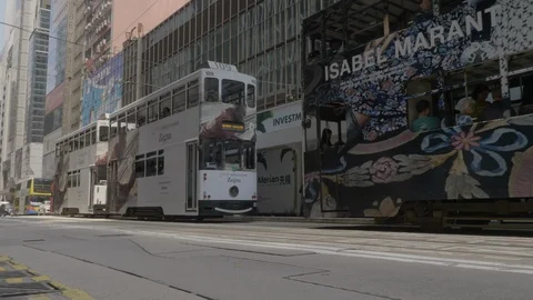 Double decker tram approach the stop in Hong Kong Stock Footage 127507500