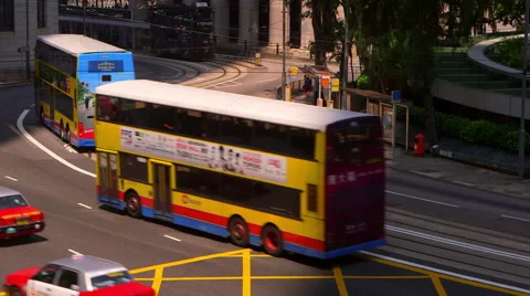 DOUBLE DECKER TRAMS BUSES CENTRAL HONG KONG Stock Footage 67012611