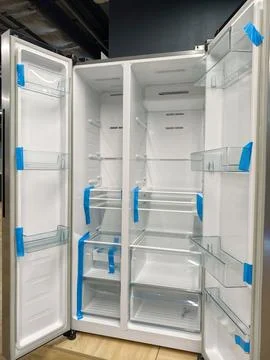 Double-door fridge, providing easy access to fresh food and beverages, avai.. Stock Photos