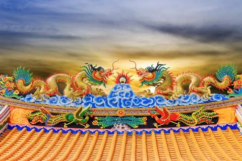 Double Dragon Statue. Sunset Stock Photos