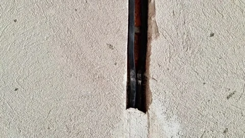 Double Electrical Outlet Boxes Installed in Freshly Plastered Wall Vídeos de archivo 338373009