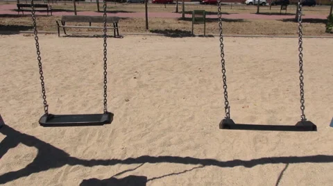 Double empty swings Stock Footage 56143101