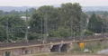 Double Encounter Two Regional Express Trains Meet Passing Moving Local Commuters 4k or 4k+ Resolution