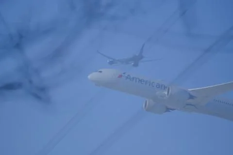 Double Exposure of American Airlines takeoff Stock Photos