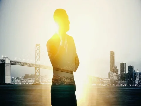 Double exposure of Brooklyn Bridge New York USA city and on the phone Stock Footage 82403134