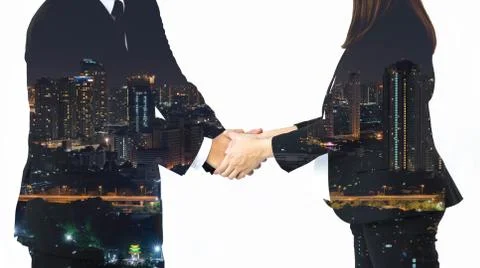 Double exposure of business handshake and city Stock Photos